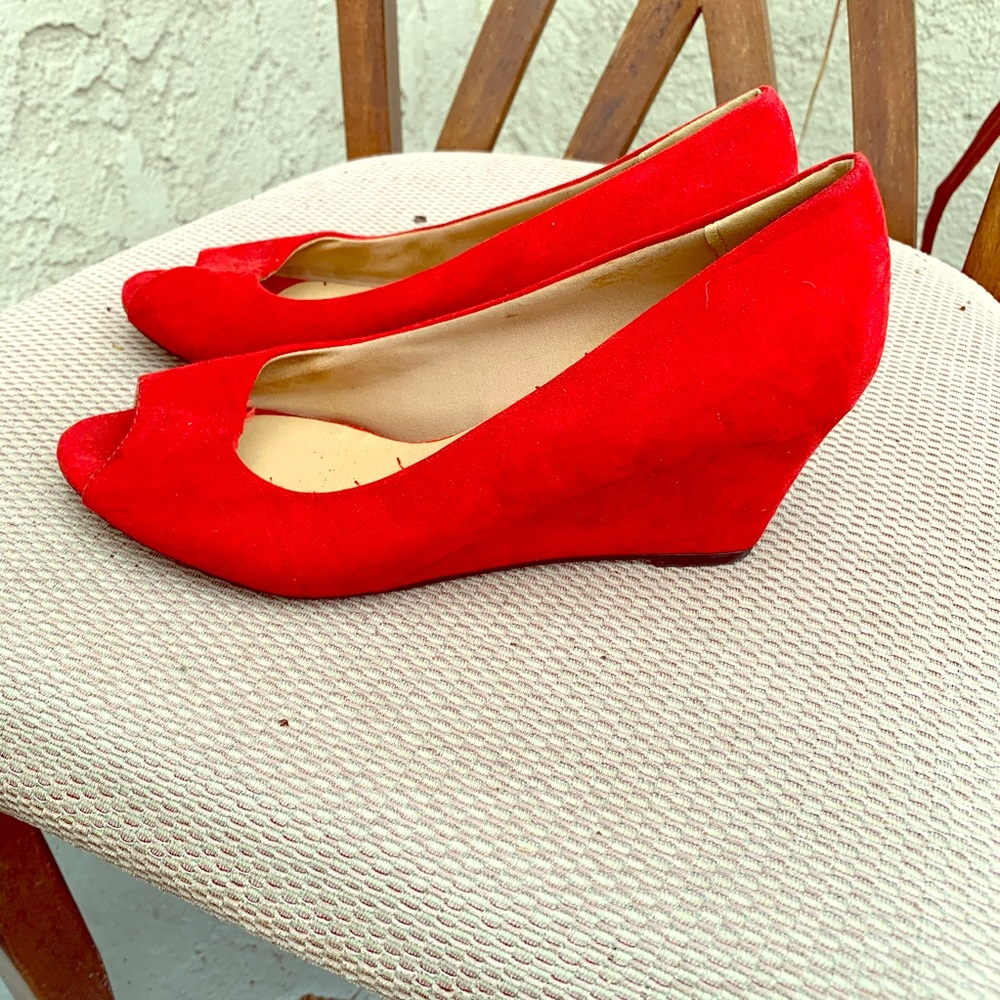 Red suede peep toe wedges.